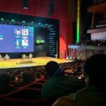 Plateia no evento Energy Summit assistindo a uma das palestras
