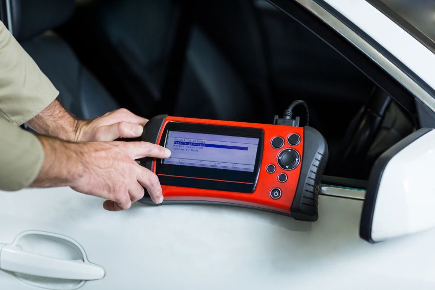Detalhe de scanner para manutenção de veículos