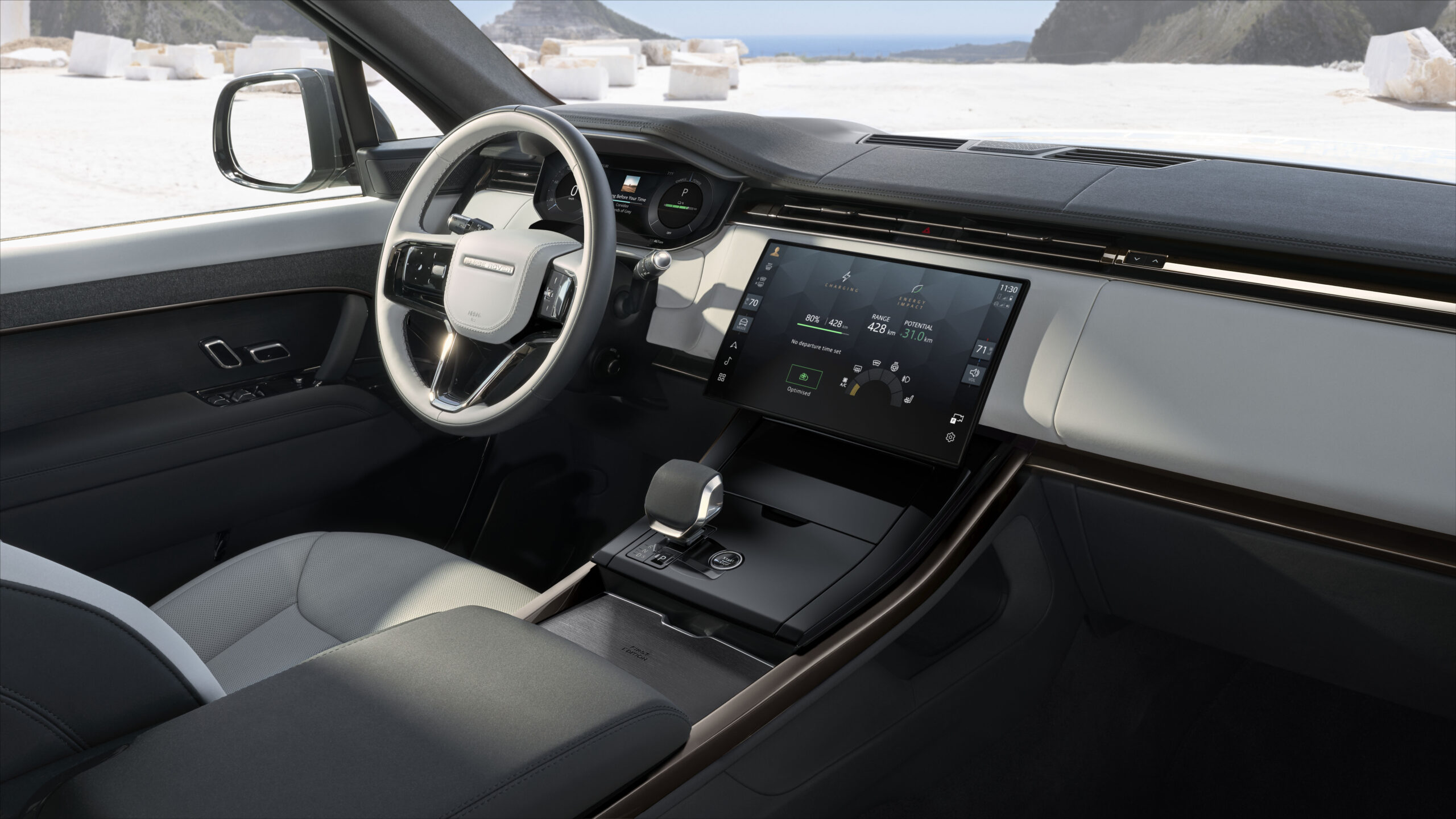 Interior do Range Rover Sport Electric conta com painel digital e central multimídia.